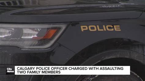 Calgary police officer charged with assaulting two family members