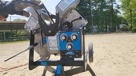 Image result for Manual Pitching Machine