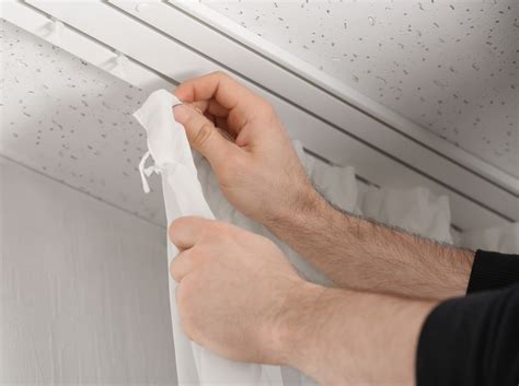 Installing Window Curtain 的图像结果