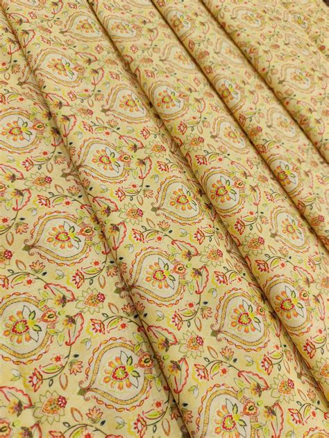 Cotton light yellow base digital print with red and green. – Dhaage Dore