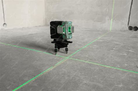 Premium Photo | Laser level, construction, finishing work in the room ...