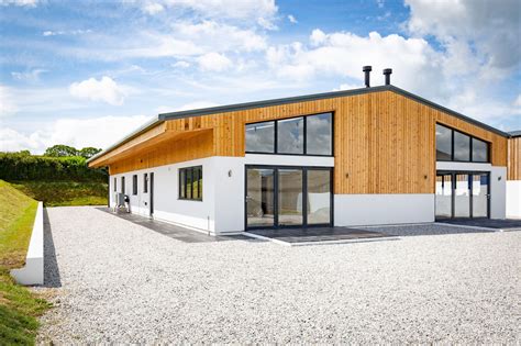 Class Q Barn Conversion with Bi-folding Doors and Gable Windows