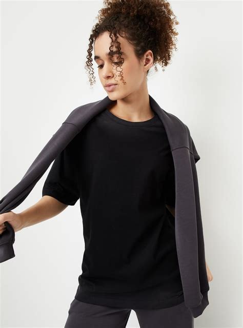 Buy Women Oversized Washed Athleisure T-shirt Online at just Rs. 499.0 ...