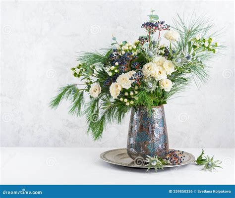 Beautiful Winter Bouquet in Vase. Flower Arrangement with Roses, Fir ...
