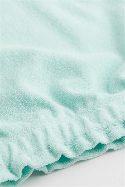 Cropped terry vest top - Light turquoise - Kids | H&M IN