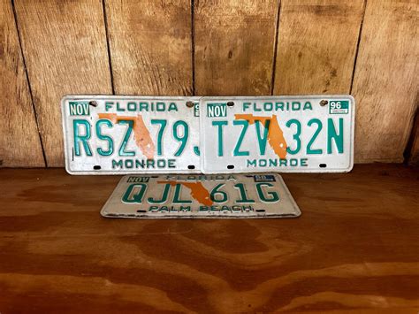 Lot #215 (3) Florida License Plates - Just Right Estate Sales