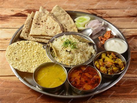 Veg thali from an indian cuisine food platter consists variety of ...