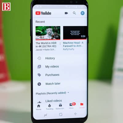 YouTube is testing a feature called Smart Downloads that automatically ...