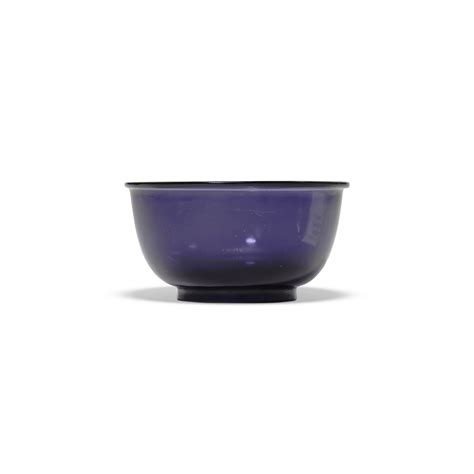 A SMALL PURPLE GLASS BOWL, QIANLONG FOUR-CHARACTER WHEEL-CUT MARK ...