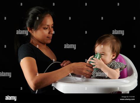 Image result for Using Inhaler and Mask