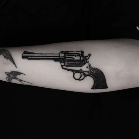 Image result for Revolver Tattoo