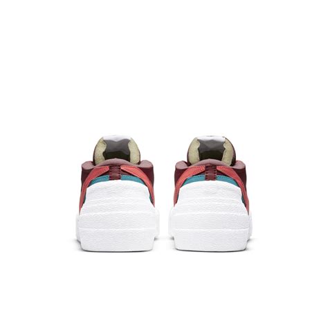 sacai x KAWS Blazer Low 'Team Red' (DM7901-600) Release Date. Nike SNKRS