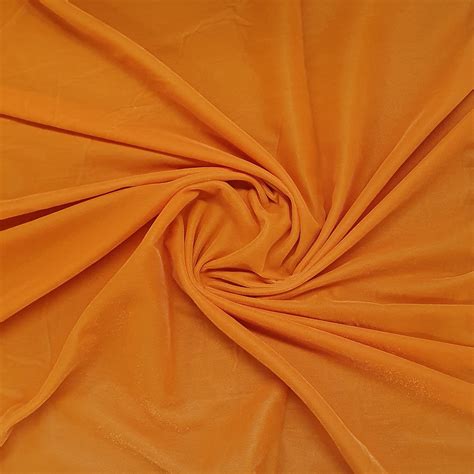 Buy Orange Solid Poly Velvet Fabric Online at TradeUNO – TradeUNO Fabrics