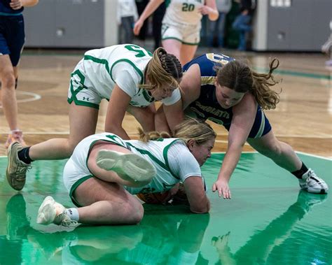 Photos: Seneca vs. Marquette girls basketball in the Falcon-Irish ...