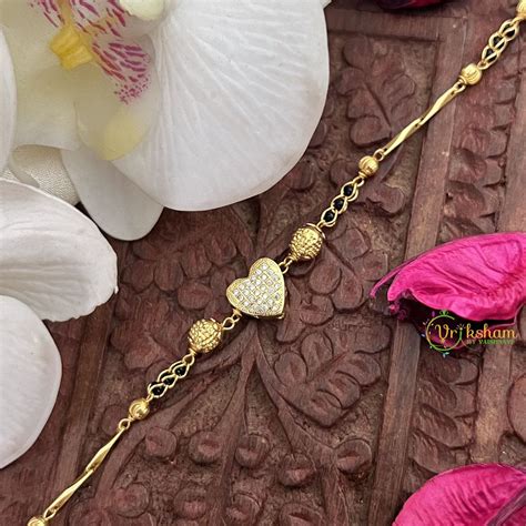Vriksham Designer Gold Chain Ad stone Heart Shape Mangalsutra Bracelet ...