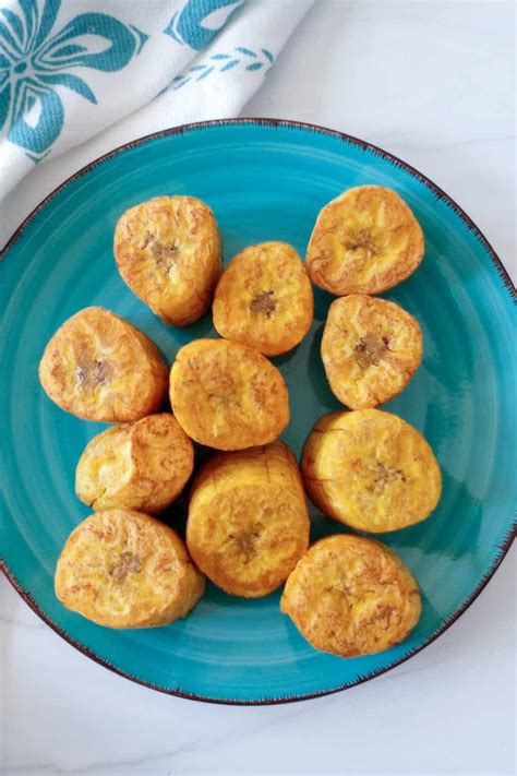 How to Make Fried Green Plantains (Tostones) - Flavored Apron