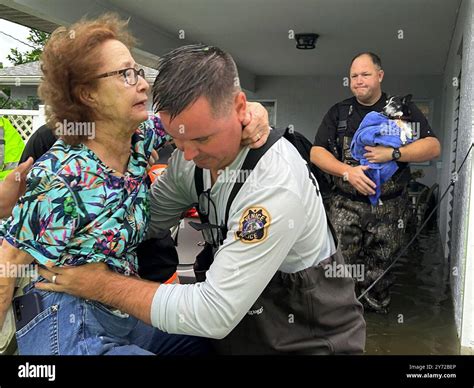 This photo provided by Venice Police Department rescue crews assist ...