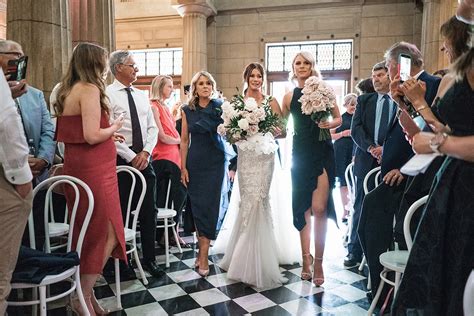 Bridesmaids Walking Down The Aisle