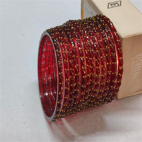 Pooja Bangles Stylish Raindrop Glass Bangles Set – JewelEMarket