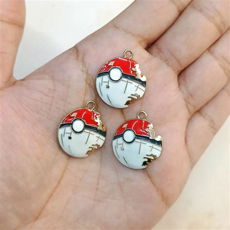 Scratched Pokeball Metal Charms – Pradhan Accessories