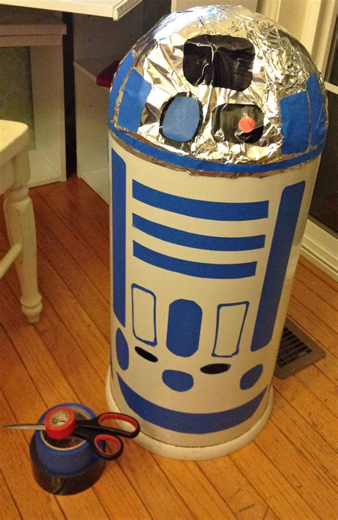 R2D2 from a dome trash can using painter's tape, tin foil, and ...