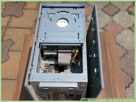 How to Install a CD Disc 的图像结果