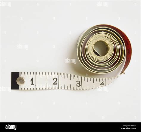 Spool of flexible tape measure, close up Stock Photo - Alamy