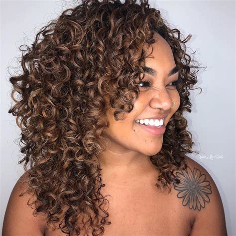 Natural curls in cute chestnut brown. We can't get enough of this ...