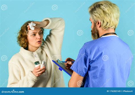 Patient and Doctor Hold Pills. Woman with Runny Nose at Nurse Consultation. Doctor Write ...