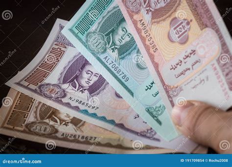 Mongolian Currency, Tugrik Money, Various Banknotes Held in the Hand Stock Photo - Image of cash ...
