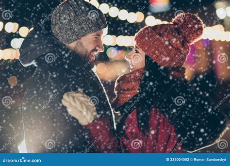 Photo of Two Affectionate People in Love at Midnight X-mas Tree Place ...