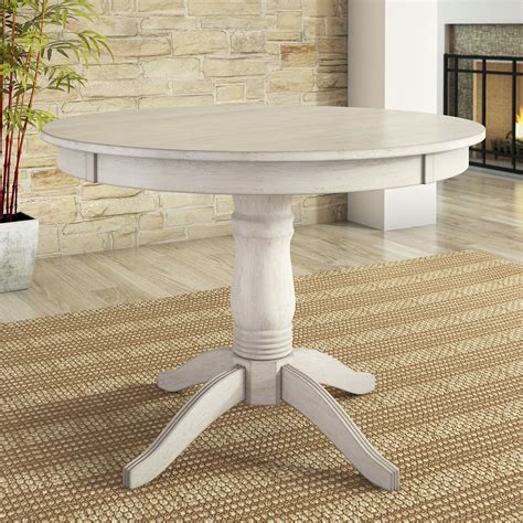 Round Pedestal Extension Dining Table