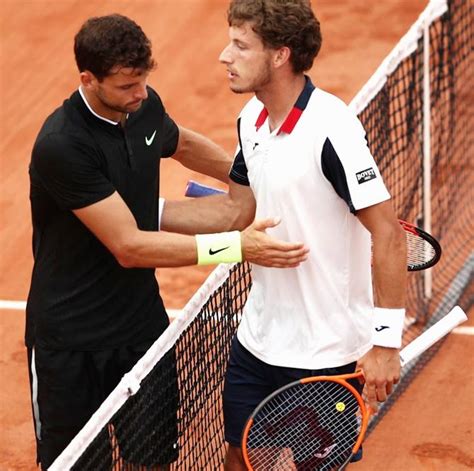 French Open PIX: Muguruza, Raonic, Thiem through to last 16; Dimitrov ...
