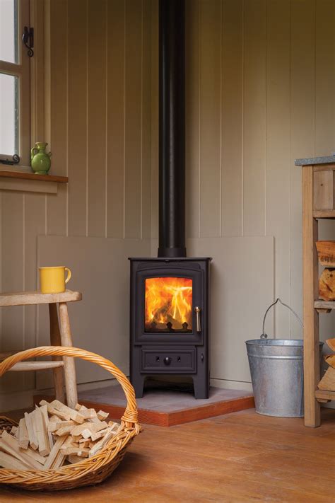 Pin by Brad Winstead on Home Ideas | Small wood burning stove, Corner ...