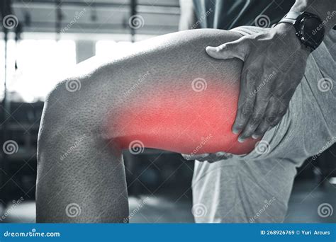 Strained Thigh Muscles Could Result in Pain. Trainer with Pain in His Leg Stock Image - Image of ...