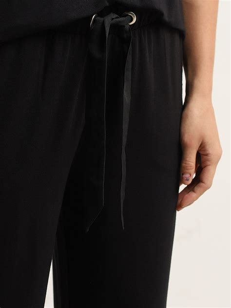 Buy Wunderlove Black Flared Mid-Rise Pants from Westside