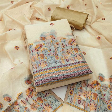 Cream and Mustard Dress Material Adorned with Floral Weaving on Chande