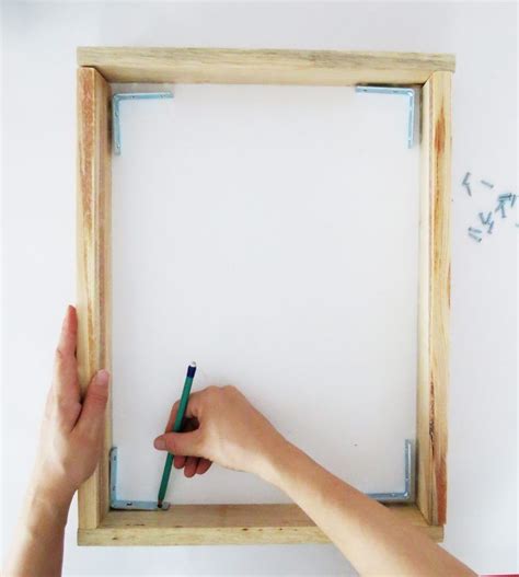 how to diy frame a canvas