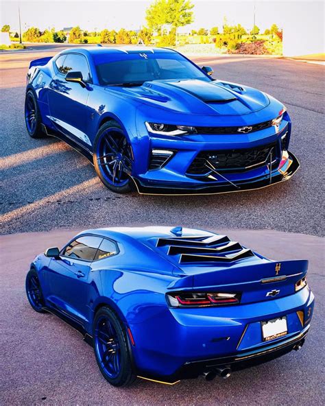 Two Blue Chevrolet Camaros Side by Side