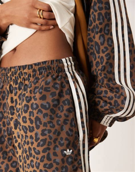 adidas Originals Firebird loose track pants in leopard print | ASOS ...