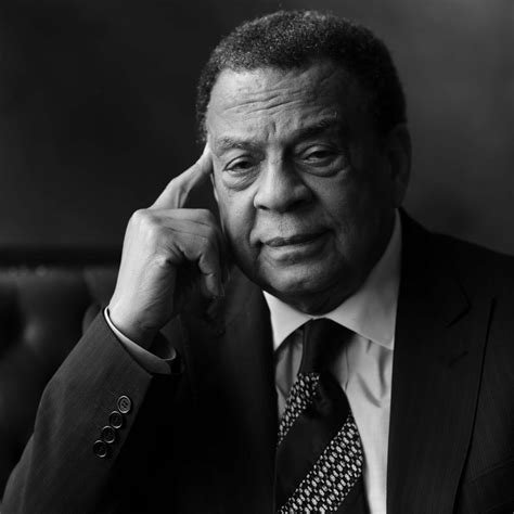 Download Andrew Young Posing With Finger On Temple Wallpaper ...