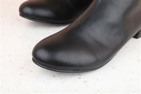 Buy Now , Women Black Solid Regular Boots