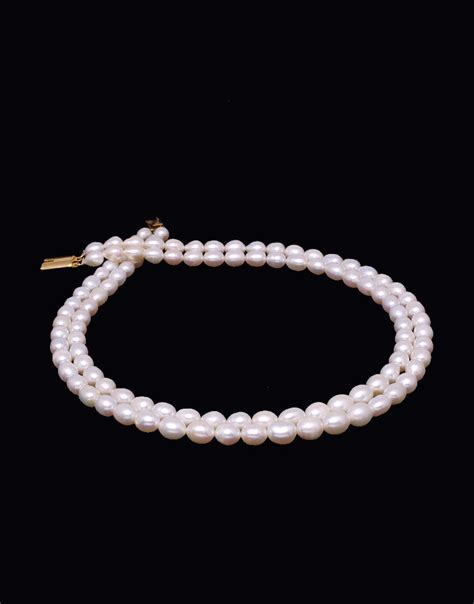 Stunning White Freshwater Oval Shape Pearl Necklace – Mangatrai Gems ...