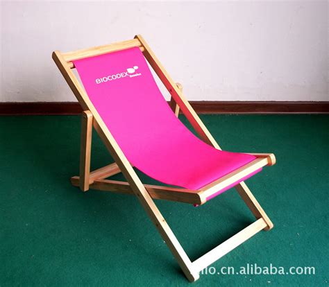 户外沙滩椅_专供户外沙滩椅牛津帆布躺靠椅便携午休木质躺椅带扶手 - 阿里巴巴