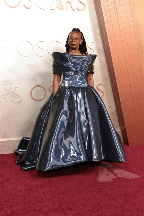 Oscars 2025: Whoopi Goldberg shines in futuristic gown on carpet - ABC News