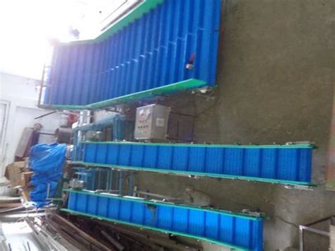 Industrial Conveyors - Truck Loading Unloading Conveyor Manufacturer ...