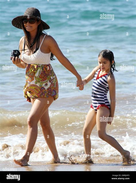 "Zookeeper" star Kevin James spends a day on the beach with his family while on holiday for ...