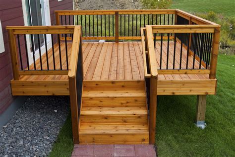 Simple, relatively inexpensive cedar deck with aluminum hybrid rails ...