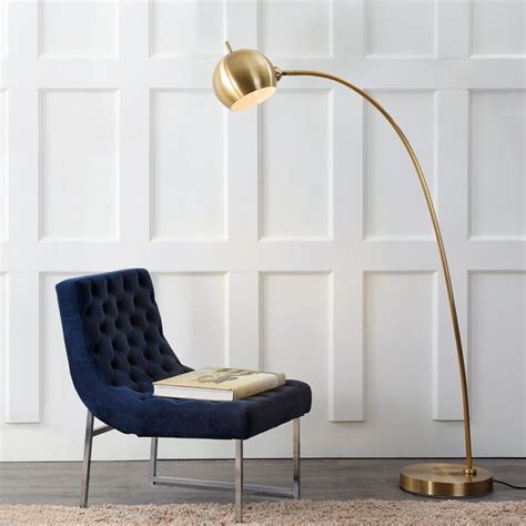 The Allure of Arched Floor Lamps in Modern Living Rooms