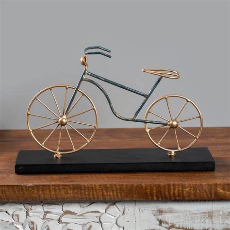 Buy VEDAS Metal Hero Cycle Table Accent from Vedas at just INR 3799.0